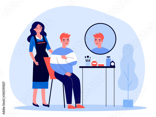 Young man visiting hairdresser. Red haired guy sitting at with woman in apron behind flat vector illustration. Hairdressing saloon, hairstyle concept for banner, website design or landing web page