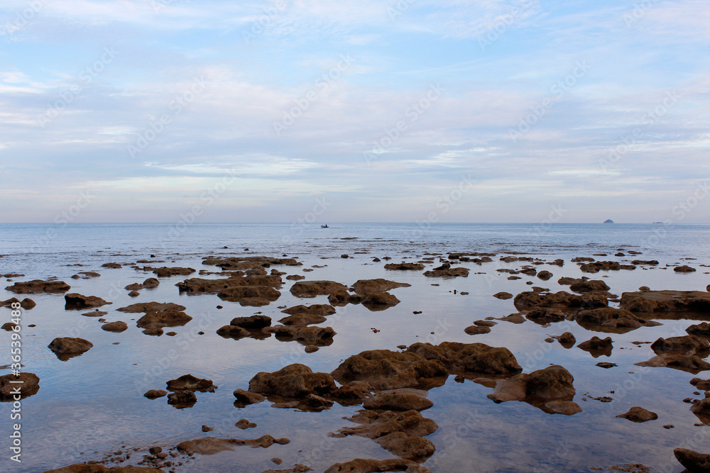 Seaside view of the low tide at dawn, Tioman Island Seaside view of the low tide at dawn, Tioman Island