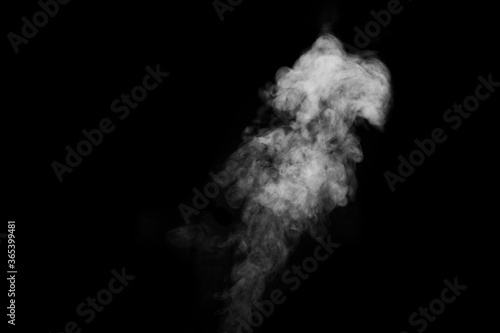 Figured smoke on a dark background. Abstract background, design element, for overlay on pictures