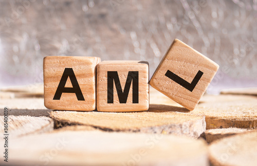 Wooden blocks with the word Aml. Business and finance concept.