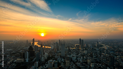 Aerial view of Bangkok City skyscrapers and blue sky the sunset background with King Power MahaNakhon viewpoint © SHUTTER DIN