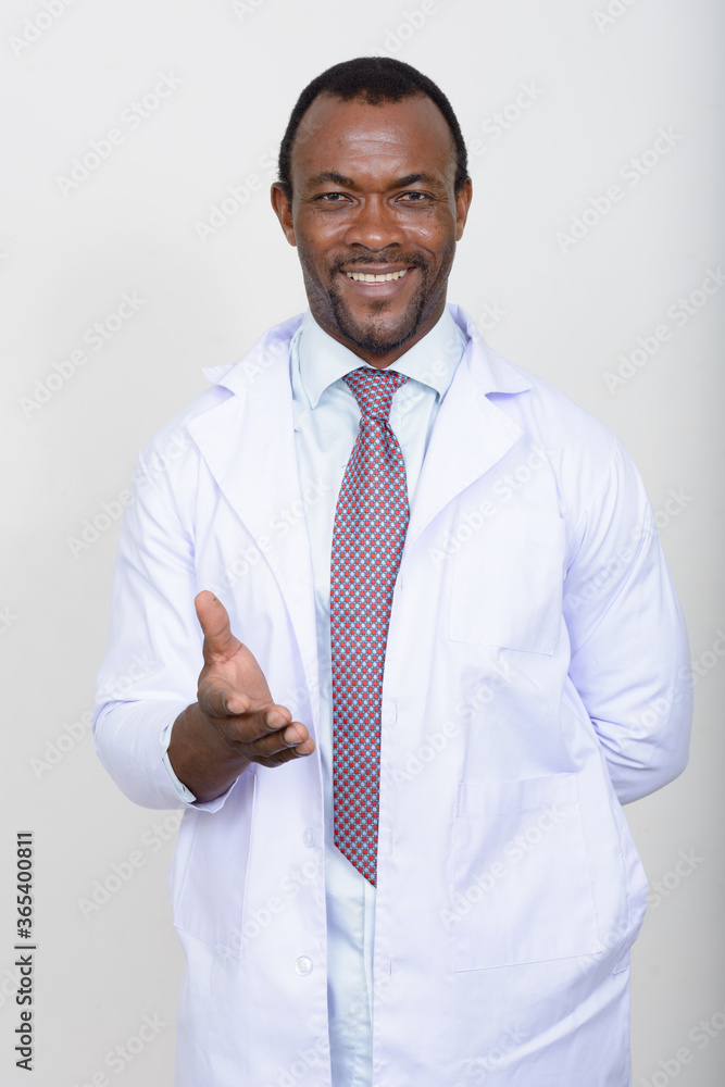 Portrait of handsome bearded African man doctor Portrait of handsome bearded African man doctor