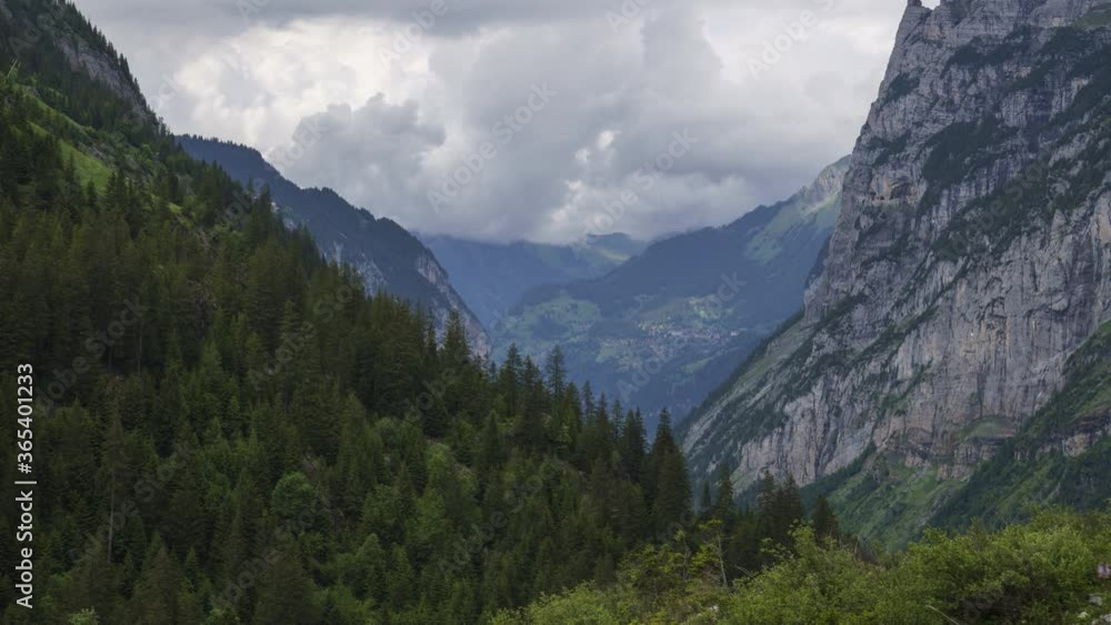 Green Forest And Lauterbrunnen Valley Near The Wengen Village In The Swiss Alps, Switzerland. - timelapse Green Forest And Lauterbrunnen Valley Near The Wengen Village In The Swiss Alps, Switzerland. - timelapse