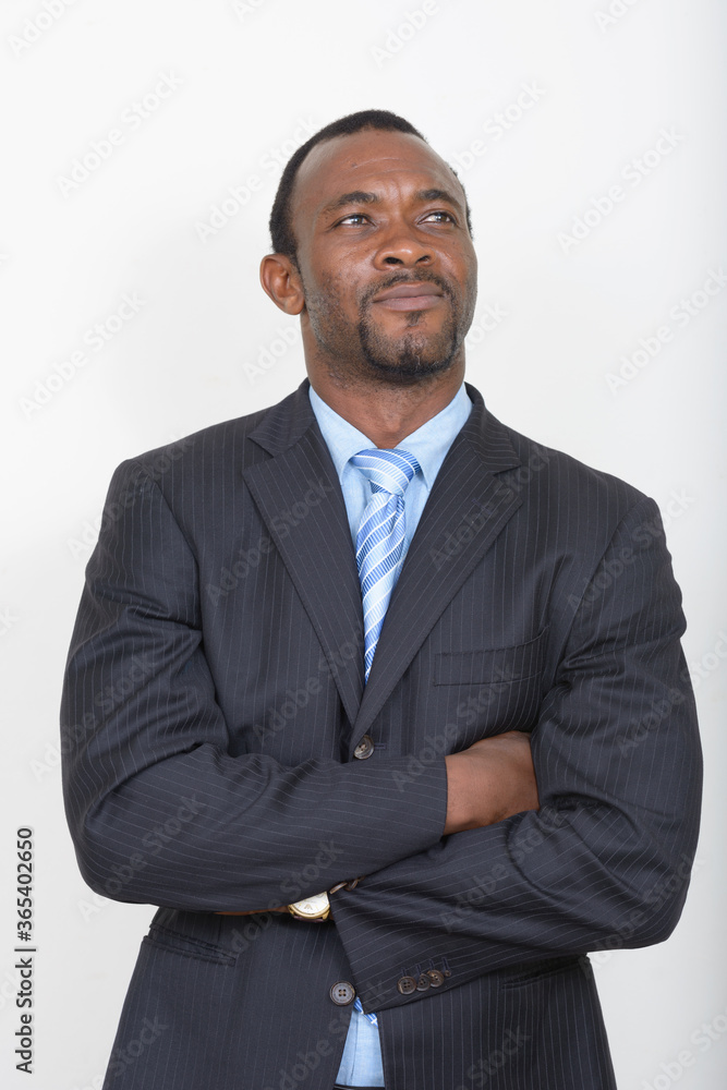 Portrait of handsome bearded African businessman in suit Portrait of handsome bearded African businessman in suit
