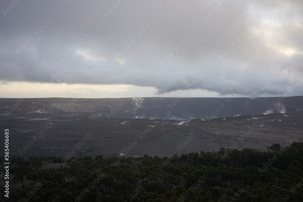 Steam cloud over Kīlauea caldera seen from Kīlauea Overlook at dusk in Hawaii Volcanoes National Park on the Big Island, on November 26, 2019.