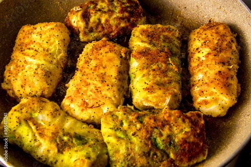 Boiled cabbage rolls covered with breadcrumbs with spices