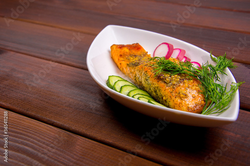 baked salmon steak with mustard breading, honey and spices