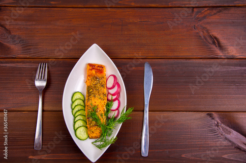 baked salmon steak with mustard breading, honey and spices