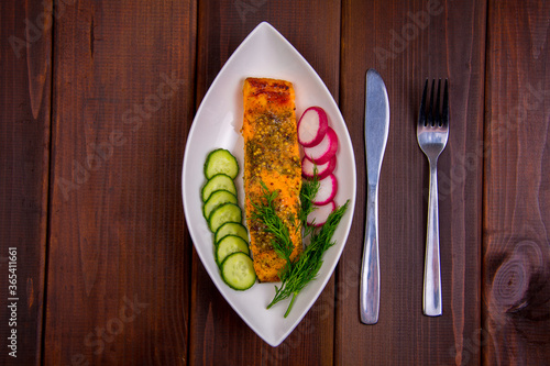 baked salmon steak with mustard breading, honey and spices