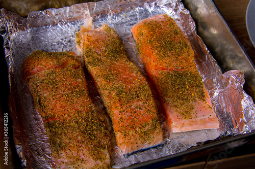 Pickled pieces of raw salmon with spices.