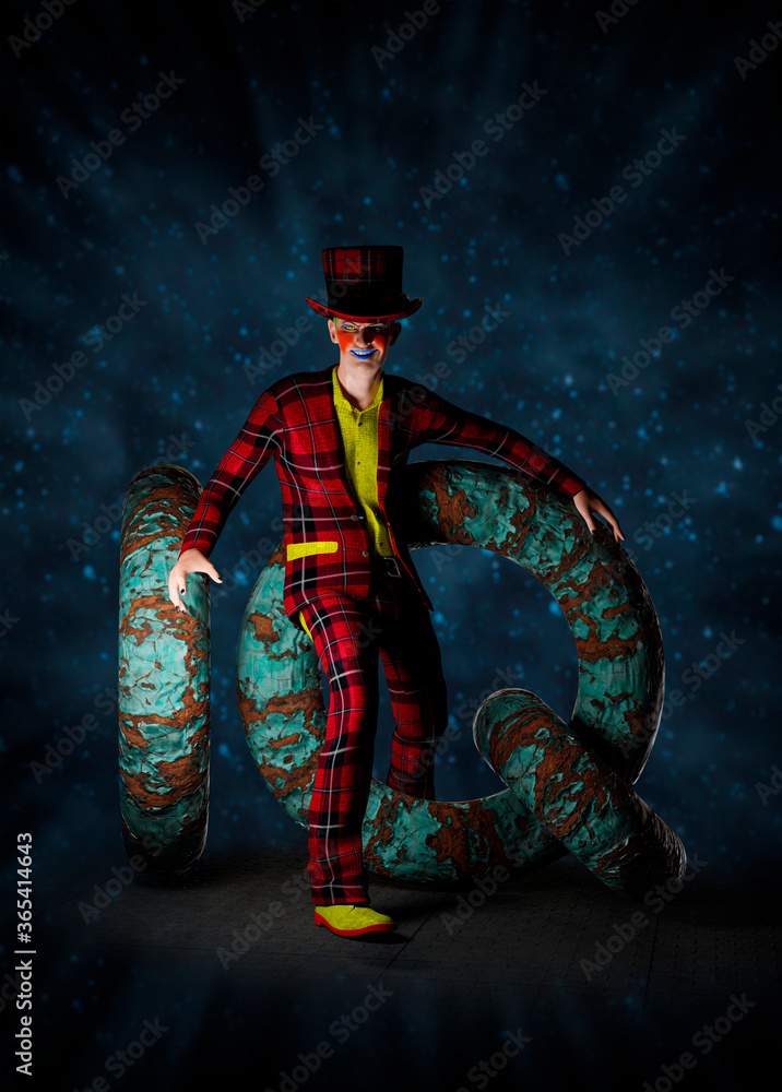 Fototapeta premium Poster of a colorful joker crawling through rusty iron rings forming the letters IQ. 3D rendering 