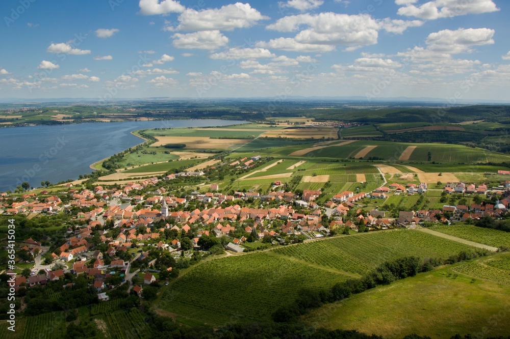The colorful wine village Pavlov and Nove Mlyny reservoirs (přehrada Nové Mlýny), on the background of traditional landscape of region of Moravia (Morava), Czechia, middle/central Europe