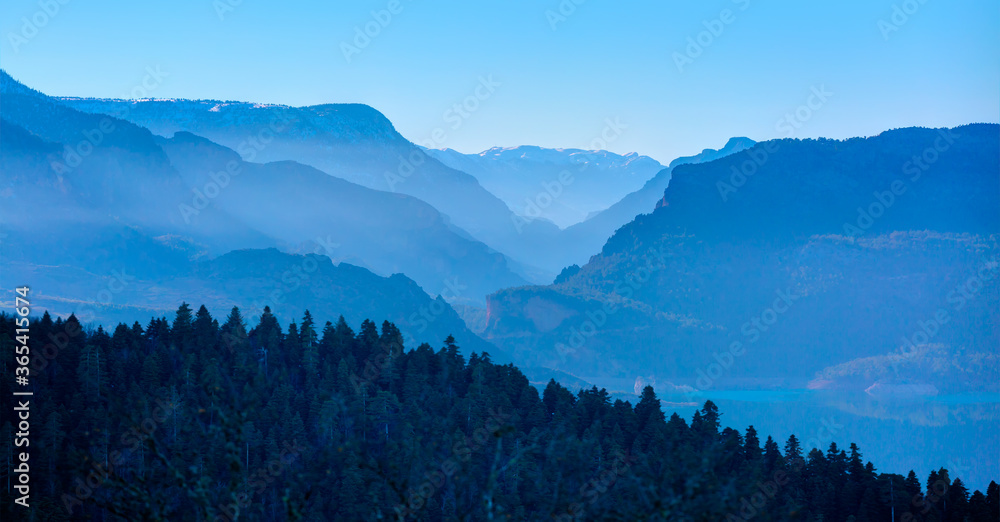 Misty view of the blue mountain range - Beautiful landscape with cascade blue mountains at the morning 