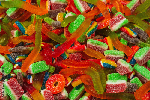 Assorted gummy candies. Top view. Jelly sweets background.