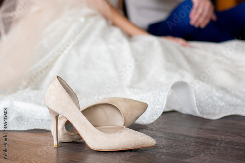 beige shoes of the bride