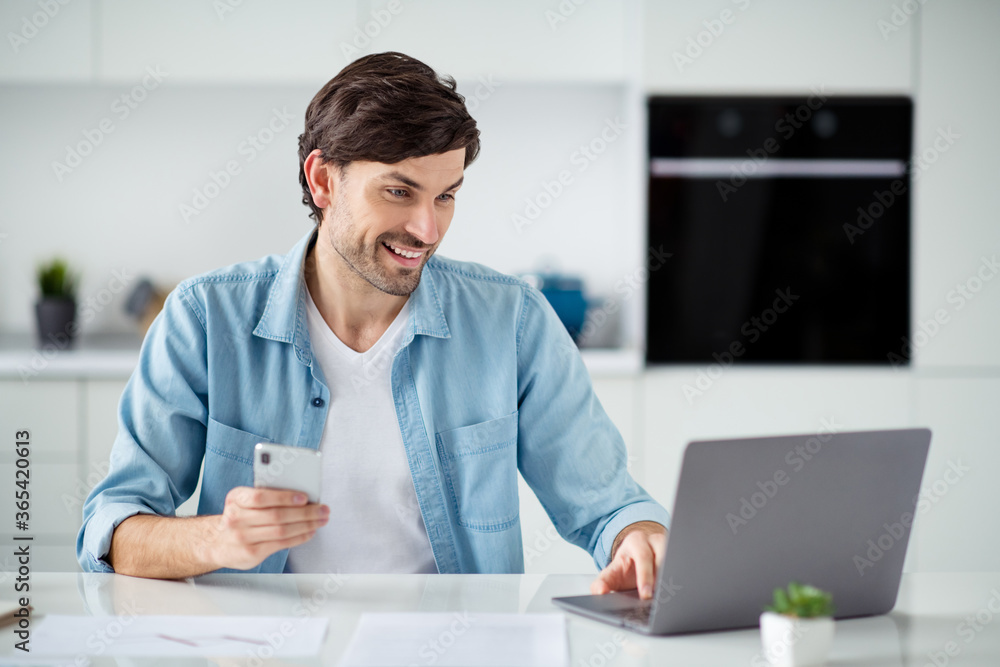 Photo of handsome guy businessman browsing notebook sit table experienced teacher work house hold app telephone prepare webinar online lesson for students quarantine indoors Photo of handsome guy businessman browsing notebook sit table experienced teacher work house hold app telephone prepare webinar online lesson for students quarantine indoors