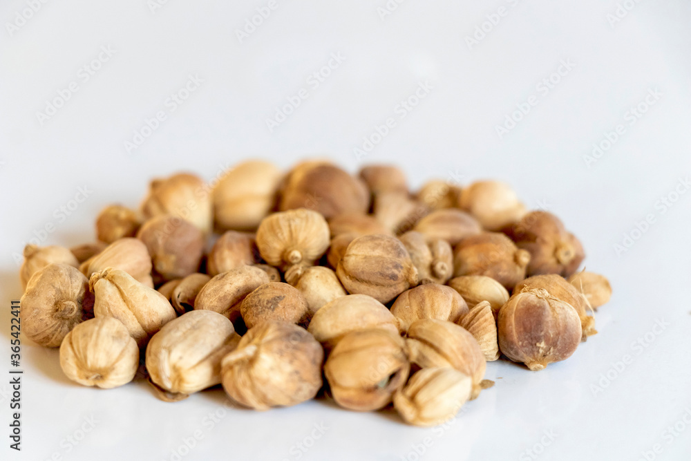 close up of cardamon seeds for seasoning cuisine isolated background.