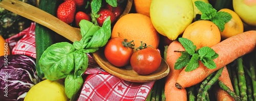 closeup of a rustic composition of fruit and vegetables