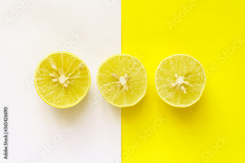 Quadro em tela Limes isolated on the white and yellow background.