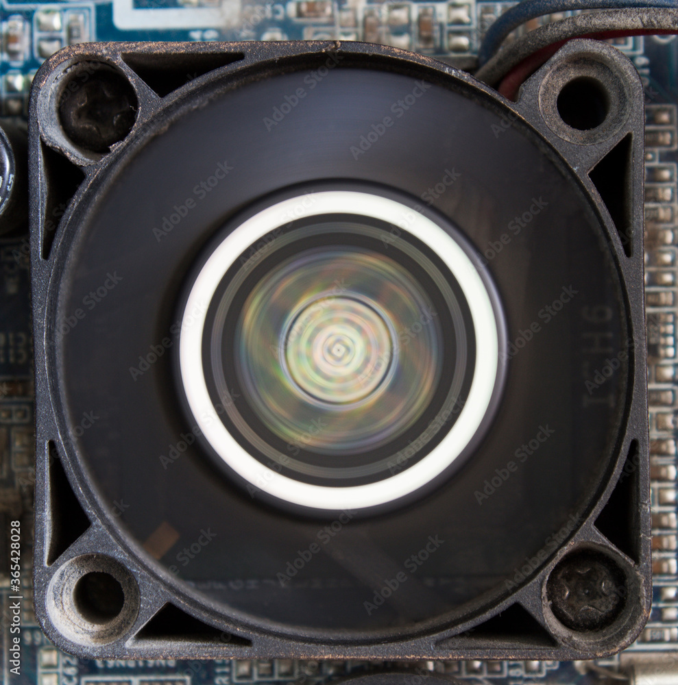 Fan. Southbridge. Chipset. Motherboard. Old computer. Electronic background. ICH6