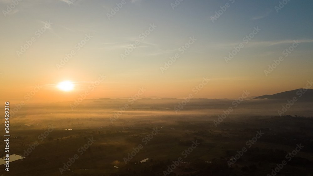 Aerial view of beautiful mountain with mist at morning in north Thailand