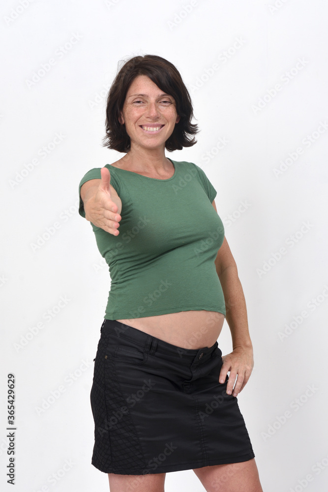 portrait of a pregnant woman shaking hands white background portrait of a pregnant woman shaking hands white background