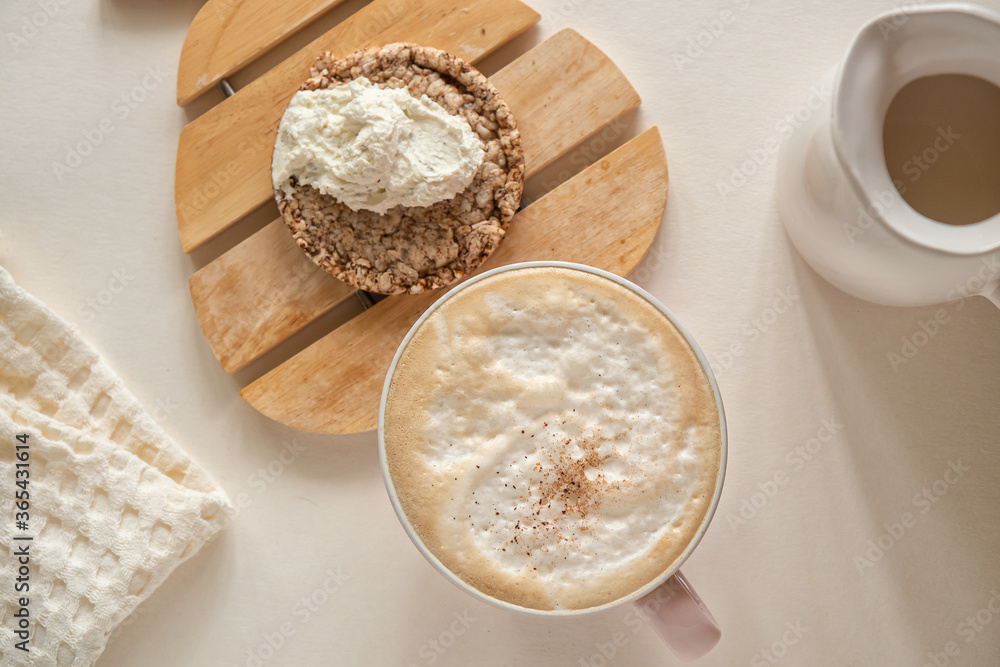 A Cup of coffee and toast with soft cheese A Cup of coffee and toast with soft cheese