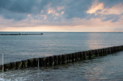 Sunset at the beach  groynes in Kuehlungsborn  Germany