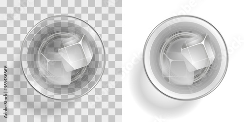 A glass with a drink and ice on a transparent background. Top view.