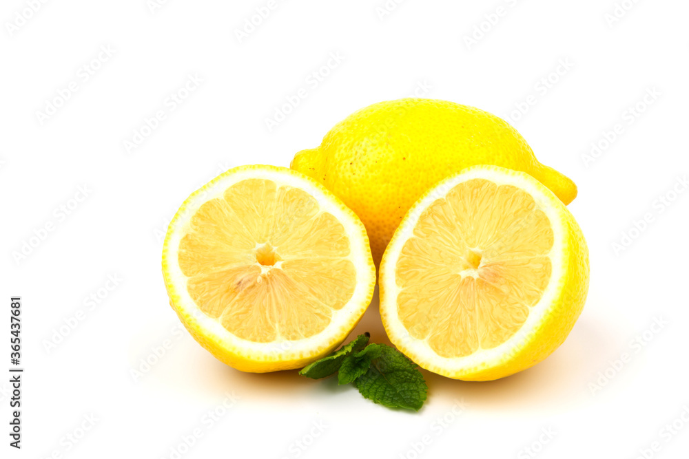 Group of lemons with mint leaves, isolated on white background