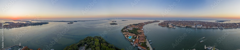 Aerial panorama of the lagoon of Venice and Lido island during sunrise