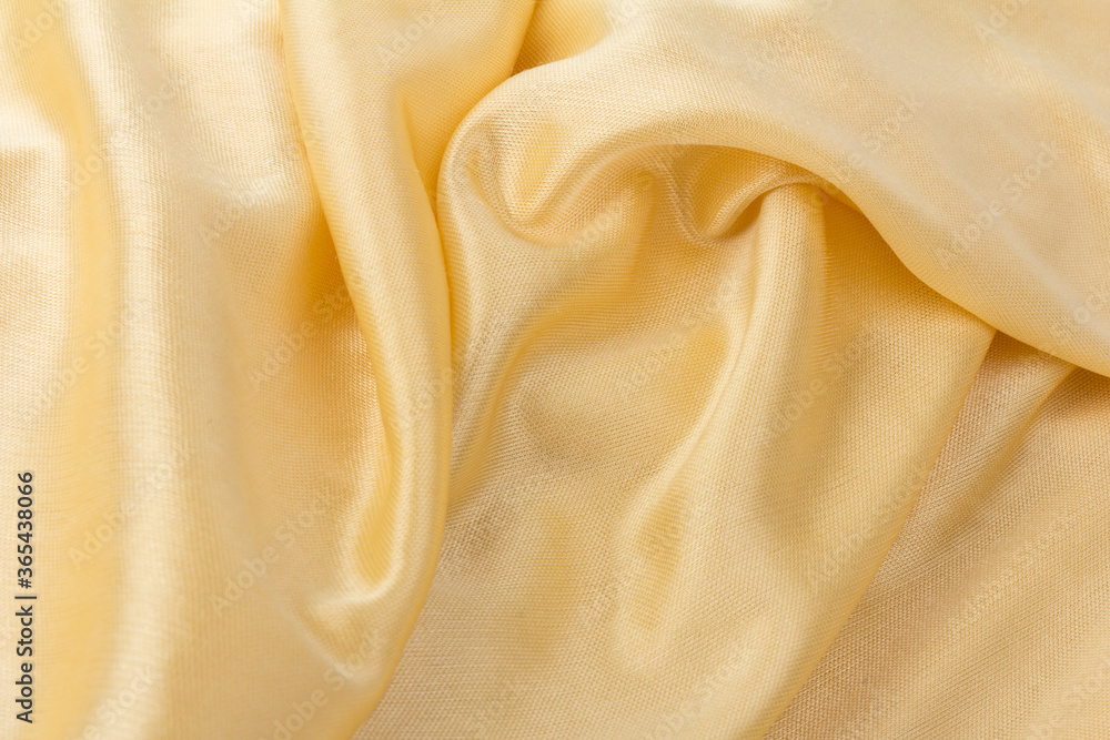 Smooth elegant golden silk or satin luxury cloth texture can use as wedding background. Luxurious background design. Retro style Smooth elegant golden silk or satin luxury cloth texture can use as wedding background. Luxurious background design. Retro style