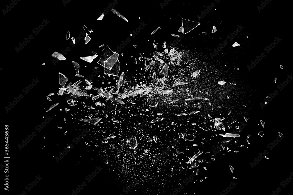 Deflated and shattered glass over black. Useful as background
