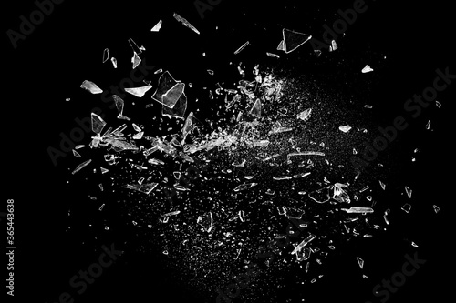 Broken glass on the black bachground.  Isolated realistic cracked glass effect photo