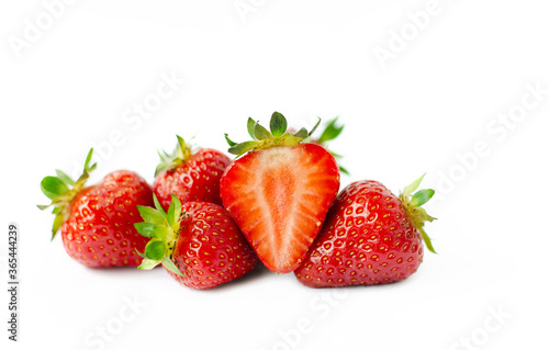 red strawberry, ripe juicy berry on a white background