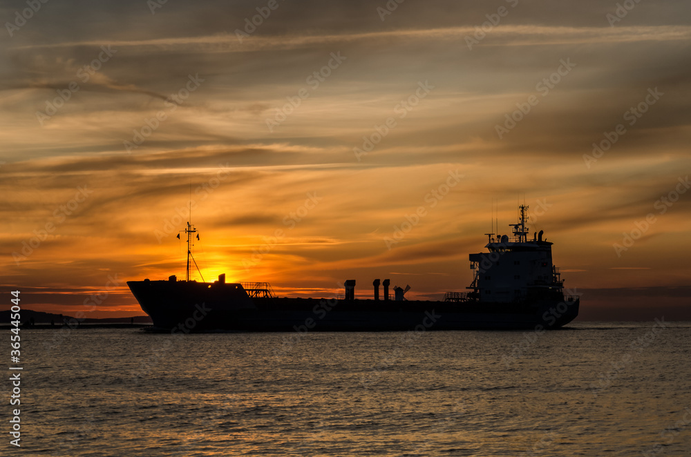 SUNSET OVER THE SHIP - Seascape in a romantic evening
