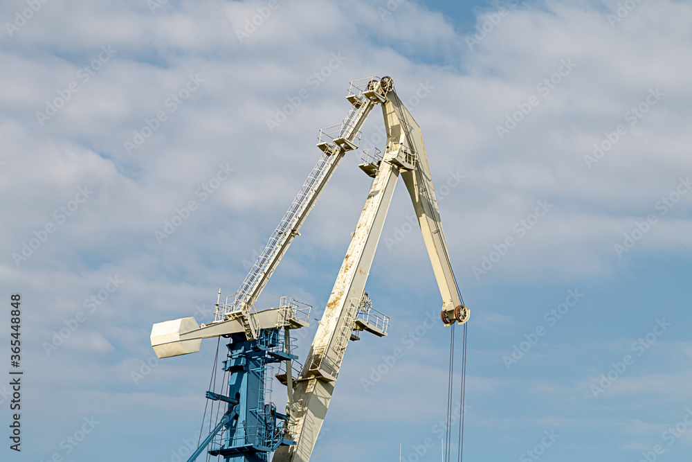 Large metal crane for lifting weights Large metal crane for lifting weights