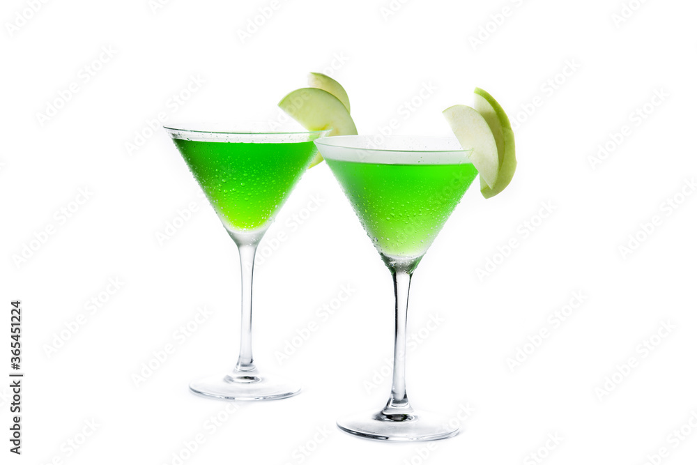 Green appletini cocktail in glass isolated on white background	