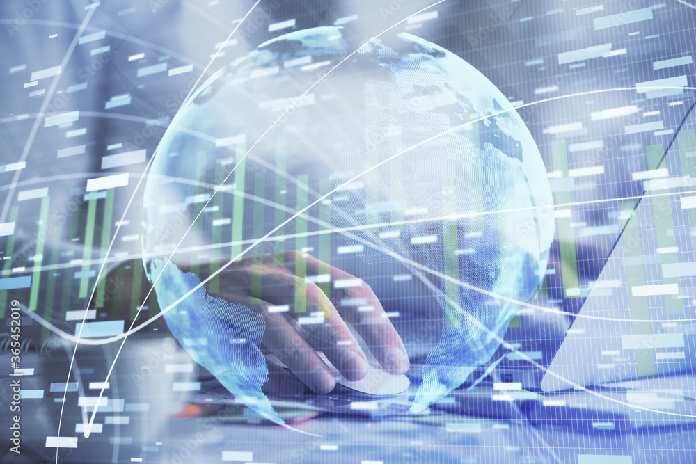 Multi exposure of businessman working on laptop on background. International business hologram in front. Concept of success. Multi exposure of businessman working on laptop on background. International business hologram in front. Concept of success.