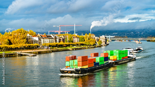 Foto Container ship on the Rhine River in Mainz - Rhineland-Palatinate, Germany