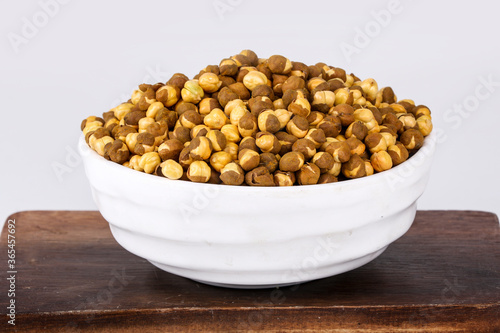 Fotografie Roasted Masala Chickpea / chana in a bowl on white background