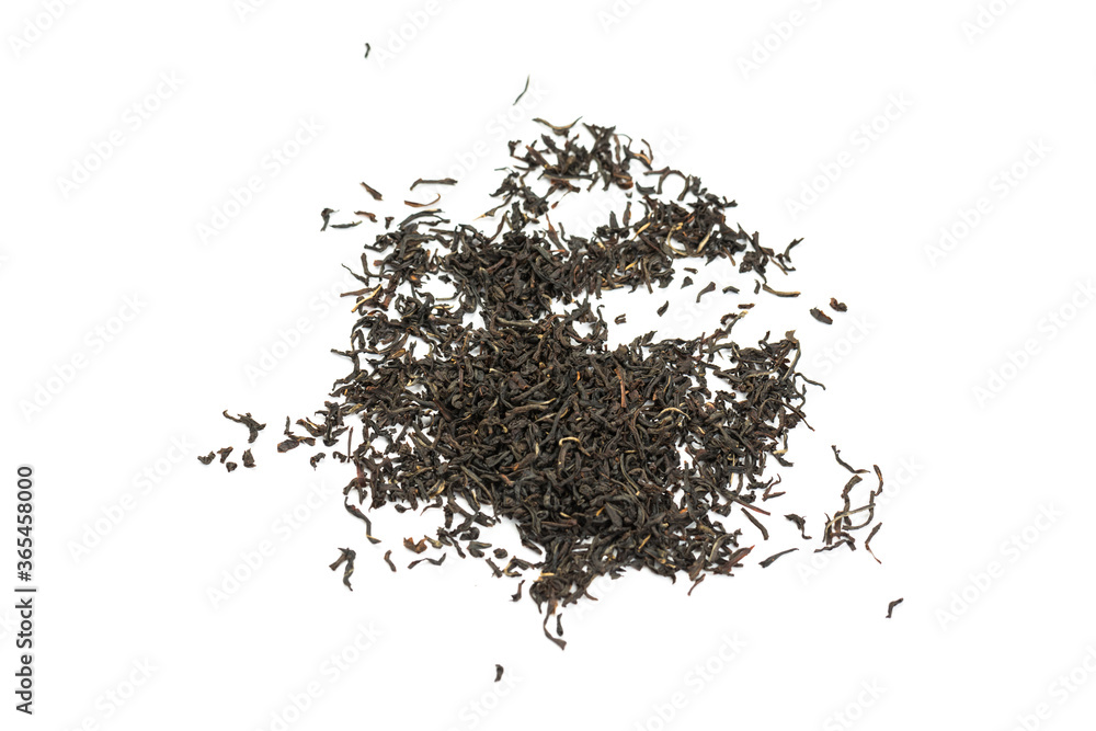 Leaves of black premium dry tea on a white background Leaves of black premium dry tea on a white background