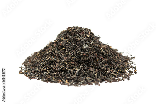 Leaves of black premium dry tea on a white background