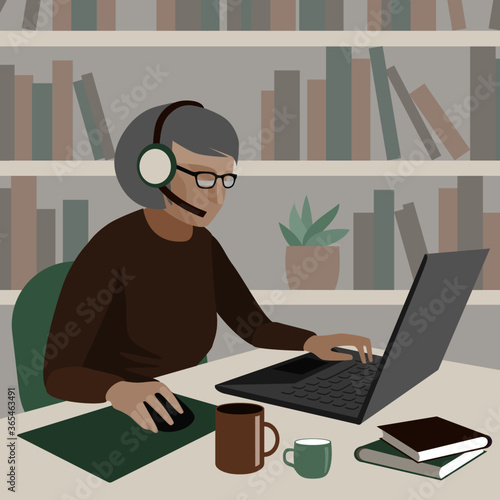 Older person in headphones with a microphone is working on a laptop. There are mugs and books on the table. Drawing in a flat style.