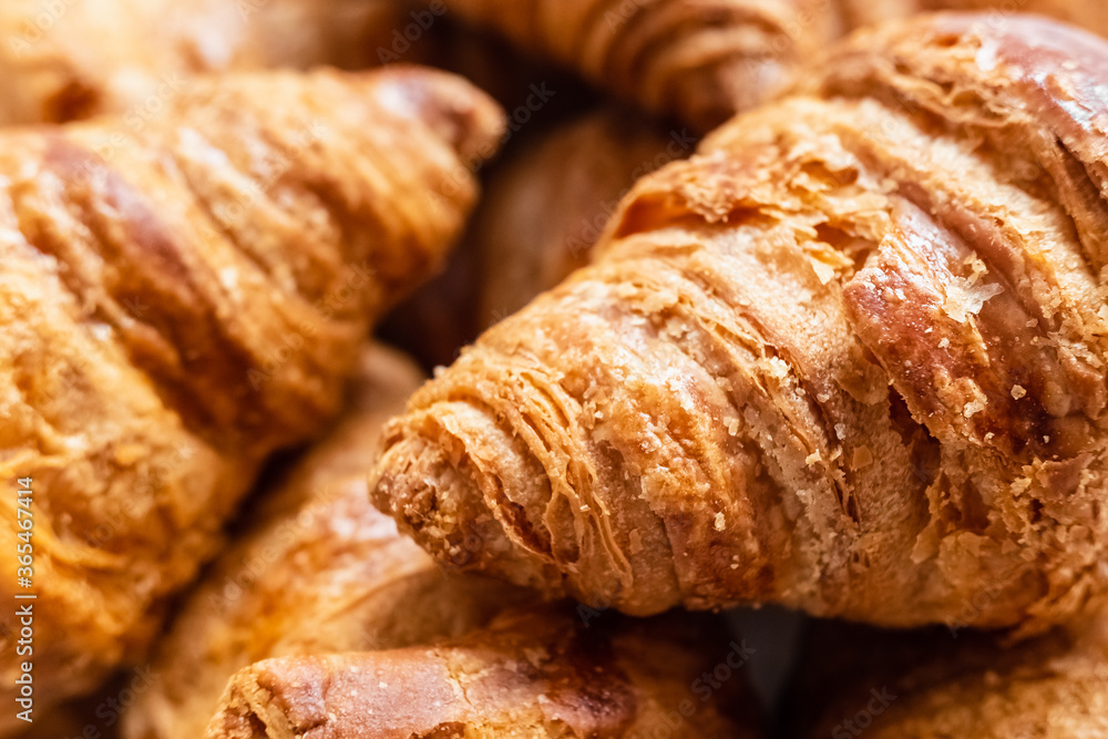 Group of crispy croissants filled with fast absorbing carbohydrates.
