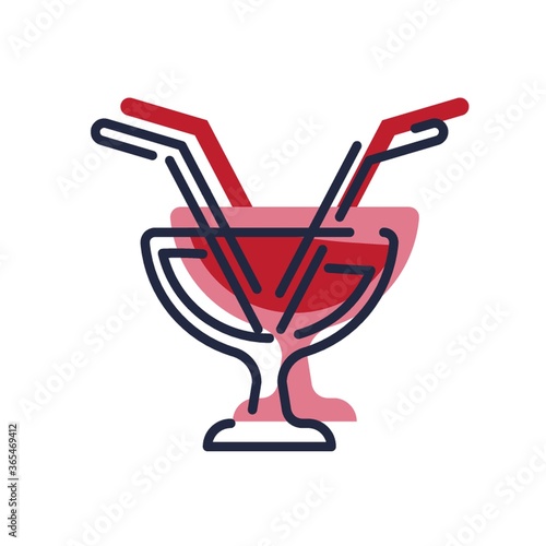 a glass with two straws