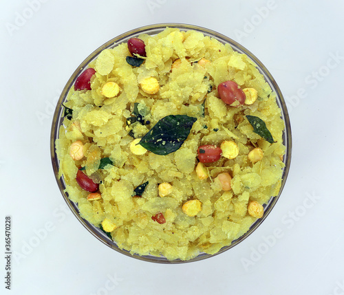 Indian Traditional Spicy And Sweet Mixture Namkeen Also Know as Chivda, Farsan, Namkin, Chiwada, or nylon chevdo  photo