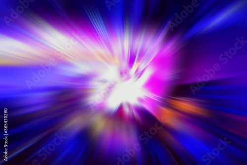 Abstract blurred radial vibrant color background.