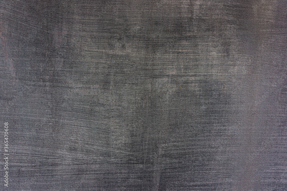 Gray cement plaster with sanding marks and scratches on the wall. Gray cement plaster with sanding marks and scratches on the wall.