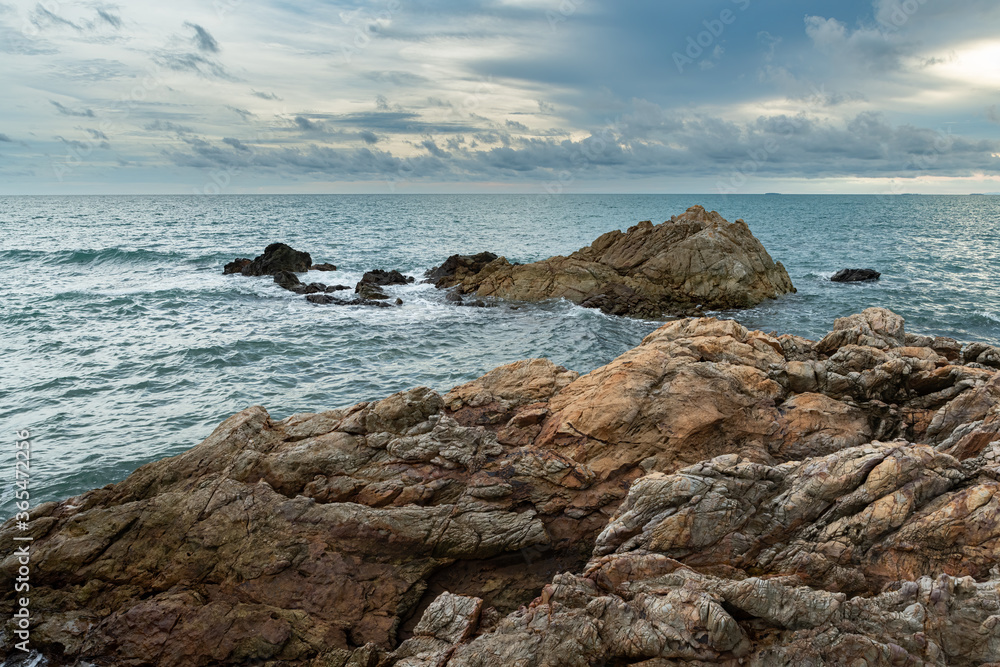 Coastal Sunset, Rocky Coastline with texture of cloudy sky in Chanthaburi province, Thailand Coastal Sunset, Rocky Coastline with texture of cloudy sky in Chanthaburi province, Thailand